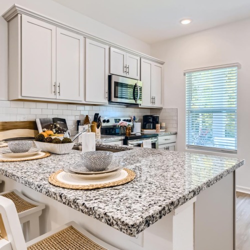 Beautiful kitchens with designer finishes a kitchen with a large island