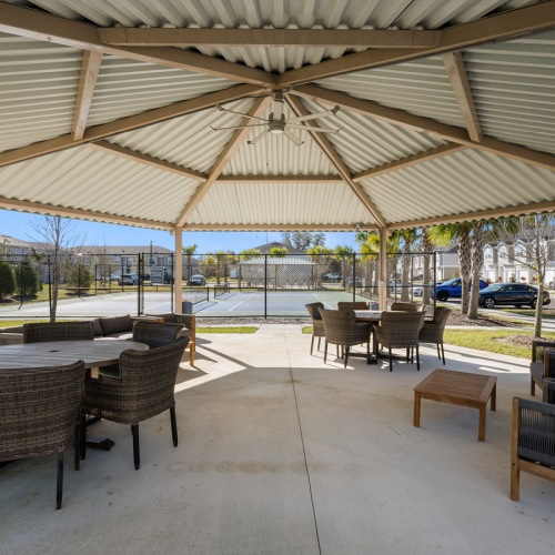 State-of-the-art amenities a large patio with outdoor chairs